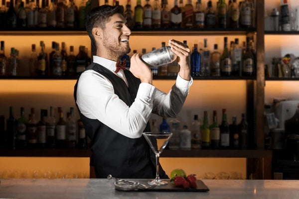 https://butikmarket.dk/cdn/shop/articles/cool-professional-bartender-making-cocktail-600nw-2085981952_600x.webp?v=1702301768